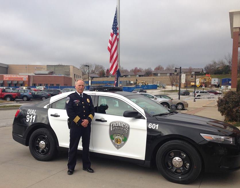 Chief Chrisman with Police Car